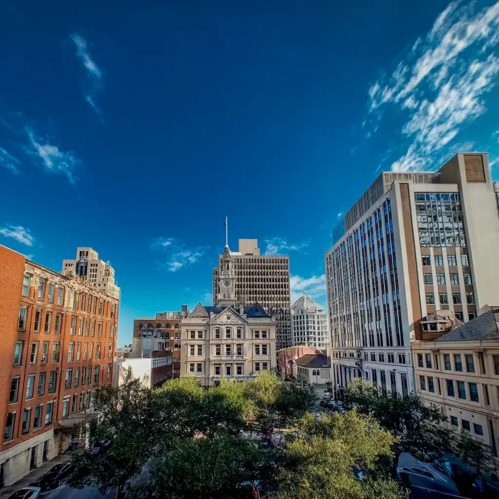 A cityscape of buildings downtown including a courthouse where you can get a restraining order.