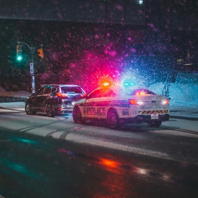 A cop car behind a vehicle. What are punitive damages? Drunk driving is one type of punitive damage. 