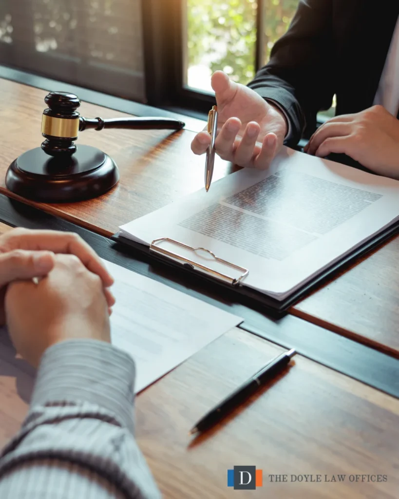 Attorney discussing confidential communications with a client during a private legal consultation